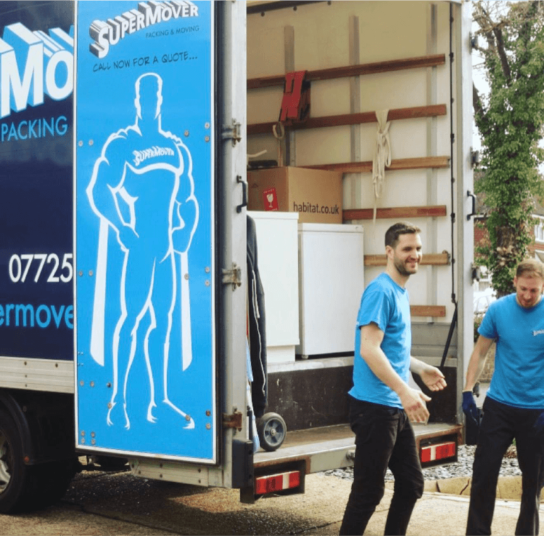 Supermover movers unloading furniture from the rear of a removals van