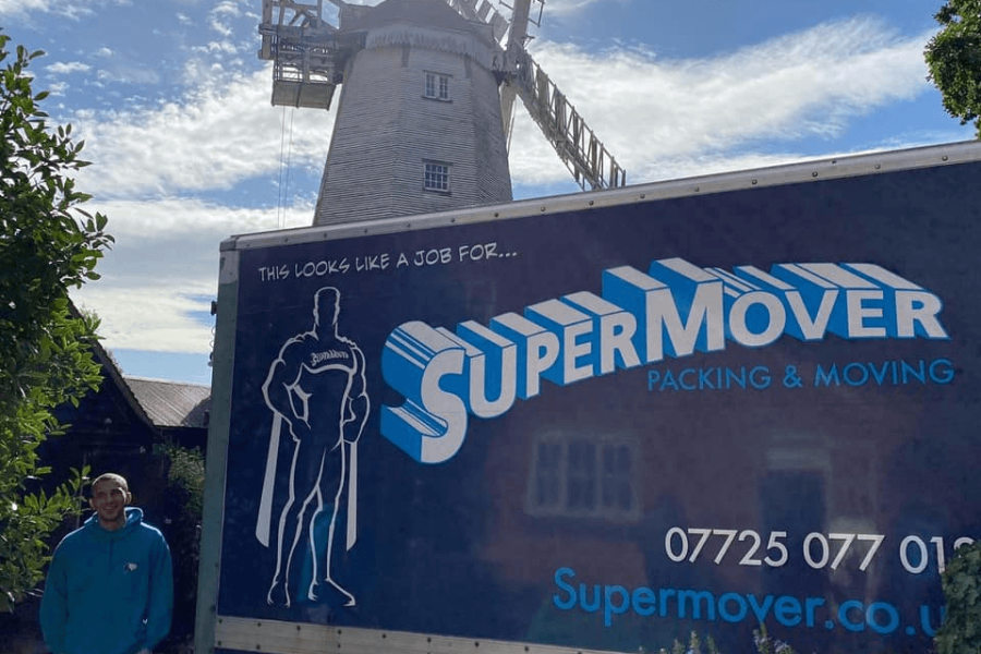 SuperMover | Removal van parked in front of local windmill