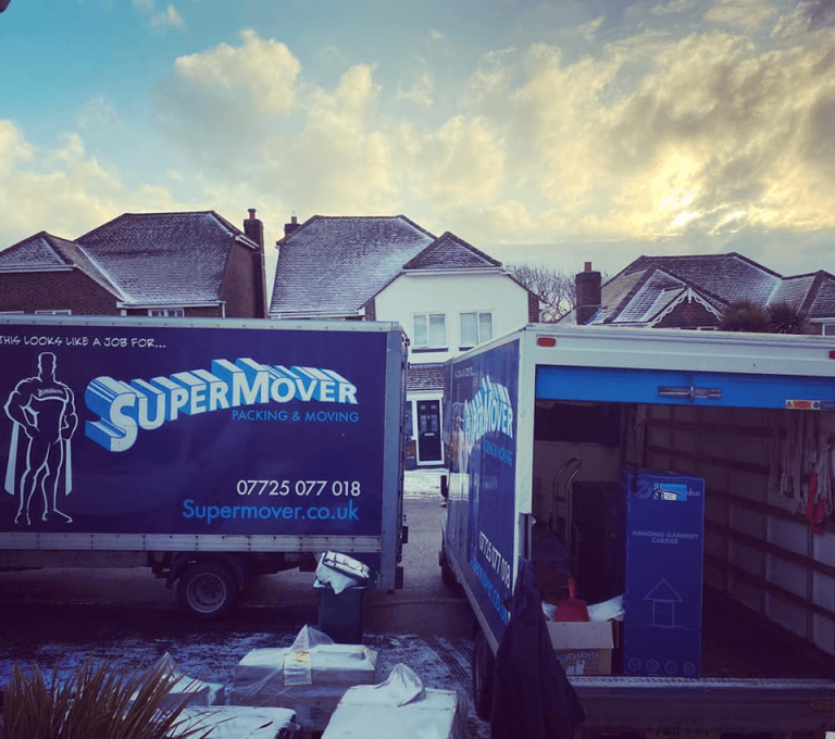 Supermover removals vans parked outside houses